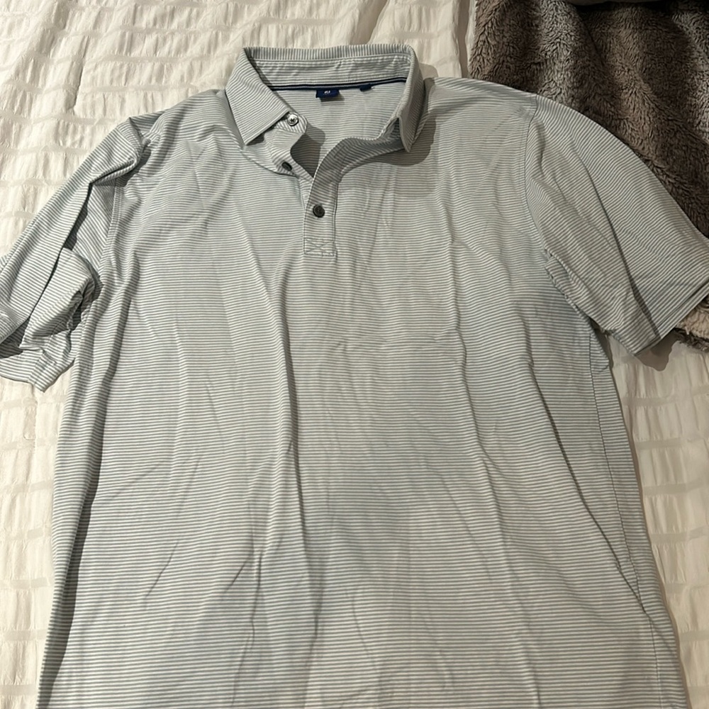Light blue and white footjoy golf polo size medium